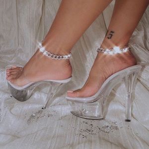 BRAND NEW Clear 6 inch heel.